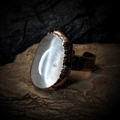 Macro shot of irregular white crystal stone on vintage bronze adjustable ring band - White Crystal - Polished