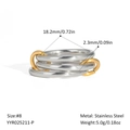 Macro detail of triple silver-tone stainless steel bands linked by two golden rings - US 8 / Three Silver Rings With Two Gold Links (YYR025211-P)