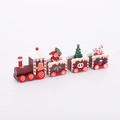Detail of wooden Christmas train with hand-painted Santa and gift figurines decor - Brown Santa Claus Style