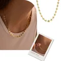 Golden five-petal flower necklace with blue gemstone accents shown from multiple angles - Blue Beaded Flower (etg)