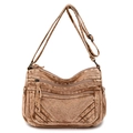 Dettaglio della borsa vintage in tela marrone con tasche multiple e zip in rame - Marrone
