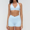 Light blue yoga set with halter bra and high-waisted crossover shorts with side pockets - S / Top And Bottom / Bra + Shorts / Water Blue