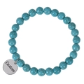 Detail of turquoise beaded bracelet featuring a custom engraved silver metal round pendant - Turquoise (Customized)