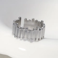 Irregular textured stainless steel open ring with vertical flowing stripe design - US 7 / Vertical Stripes (JR203) / Steel