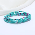 Close-up of turquoise and pink layered seed bead waist chain on white fabric background - 80cm / Turquoise/Rose Red/Cream