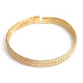 Minimalist gold woven cuff bracelet in stainless steel with a sleek open-end design - Web Weaving Pattern 5 / Gold