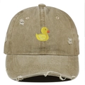 Close-up of yellow duck embroidery and vintage distressed details on khaki cotton cap - One Size / Khaki