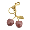 Sparkly red cherry keychain with gold leaves and ring on a clean white background - Champagne Cherry Bronze