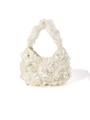 Macro shot of 3D satin rose flowers on a white crescent evening bag for weddings - White