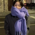 Thick purple mohair scarf with long tassels shown on female model outdoors at night - Elegant Purple
