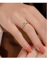 Elegant rose gold classic solitaire ring with round cubic zirconia on a female finger - In The Name Of Love 1 Carat Ljz-80 / Adjustable Open