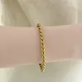 Stackable 4mm twisted gold bangle made of stainless steel with a minimalist vintage texture - Vintage Twisted Rope Bangle (A1181) / Gold