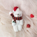 White teddy bear plush in a red Christmas hat and scarf as a festive bag accessory - White Bear With Green Red Scarf
