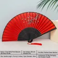 Chinese style folding fan with white plum blossom pattern on red silk and black bamboo frame - White Plum Red Surface