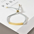 Minimalist light blue braided cord bracelet with a polished gold curved bar for couples - Grey Rope Gold