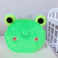 Close-up of a green plush frog coin purse with 3D eyes and metal keychain attachment - Frog