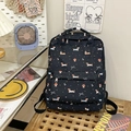 Schwarzer Rucksack mit Cartoon-Dackel und weißen Schleifen-Prints sowie Vordertasche - 30 X 45 X 13 Cm / Schwarz