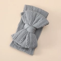 Detailed view of gray cable-knit texture on a soft oversized baby bow headband - Gray