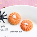 Detailed view of 2cm orange daisy resin flower accessory for DIY crafts and jewelry - Cream Biscuit