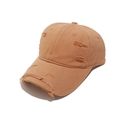 Close-up of distressed vintage orange baseball cap showing ripped details and frayed edges - M (56-58cm) / Orange