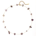 Detail of gold chain necklace featuring raw purple amethyst stones and S.steel tag - Purple