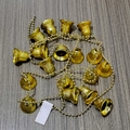 Golden Christmas bell chain featuring embossed patterns on metallic beads for festive decor - 2.1M Gold Carved Bell Chain (PS-63)
