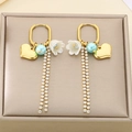 Detail of heart charm earrings with lily of the valley and zircon tassel chains - Lily of the Valley Rhinestone Tassel Style (KE118731-SP)