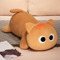 Detail of cute orange plush cat toy with big eyes on cozy blanket for home decor - 50cm / Yellow Cat