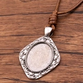 Antique silver oval pendant base with scrolls and brown adjustable wax cord - Scroll Pattern Style(19)