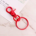 Bright red lobster clasp metal keychain with key ring on white marble surface - Red