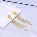 Gouden Evil Eye oorbellen met lange kristallen kwastjes op een witte achtergrond - Dangle Earrings