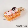 Realistic cream sandwich cookie keychain with pink glaze and colorful sprinkles detail - Double Layer Cream Dark Chocolate Cookie-Gold Buckle