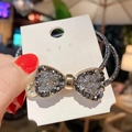 Detailed macro of vintage crystal bow hair tie featuring shimmering rhinestones - Bowknot-No Card / Silver