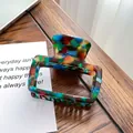 Rectangle acetate hair claw clip with colorful marble pattern and hollow design - 6.6cm / Blue Brown