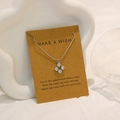 Silberne Blumen-Kreuzkette mit Zirkonia-Steinen auf Make a Wish Geschenkkarte - Rhombenquadrat Zirkon (X-363)