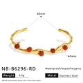 Detail of gold stainless steel bangle with red agate beads showing 60mm diameter and 9mm width - Red Bead (NB-B6296-RD)