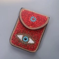 Sac bandoulière bohème en perles rouges avec motif œil protecteur bleu et fleurs - Mauvais Œil Rouge