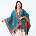Teal ethnic shawl with paisley border, red accents and fringe details on model - Teal/Border Paisley