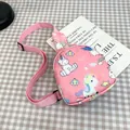 Pink kids crossbody bag featuring cute cartoon unicorn and rainbow prints on nylon fabric - Pink