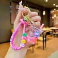 Cute pink milk tea cup keychain with glitter quicksand and purple bunny doll - Pink StellaLou Milk Tea Cup