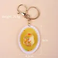 Miniature food keychain featuring a realistic steamed scallop design with gold metal ring - Oval Platter - Scallops / Gold 8-shaped Clasp