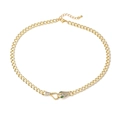Dettaglio macro della collana serpente oro 18K con occhi verdi e pietre in zirconia - Occhi Verdi