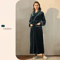 Unisex forest green flannel bathrobe with white trim and belt in a cozy home setting - Forest Green (Women)