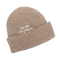 Close-up of Cold Latte embroidery on light beige warm knitted beanie hat - Khaki
