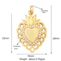 Detailed view of 18mm gold plated double heart pendant with micro pavé cubic zirconia - Sacred Heart Crown / Gold
