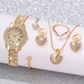 Golden luxury jewelry set featuring a diamond-studded watch, necklace, and heart accessories - Gold