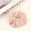 Soft beige plush scrunchie in faux fur with fluffy texture and elastic band - Beige