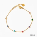 Bracelet en acier inoxydable doré orné de huit pierres précieuses rondes colorées - Bracelet Or Zirconia Coloré (SBK132)