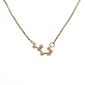 Close-up of gold Scorpio zodiac pendant with sparkling zircon stones on box chain necklace - I-Scorpio