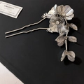 Detail of silver floral hair pin with hollow flowers and sparkling crystal rhinestones - Hollow Flower Tassel Style / Silver